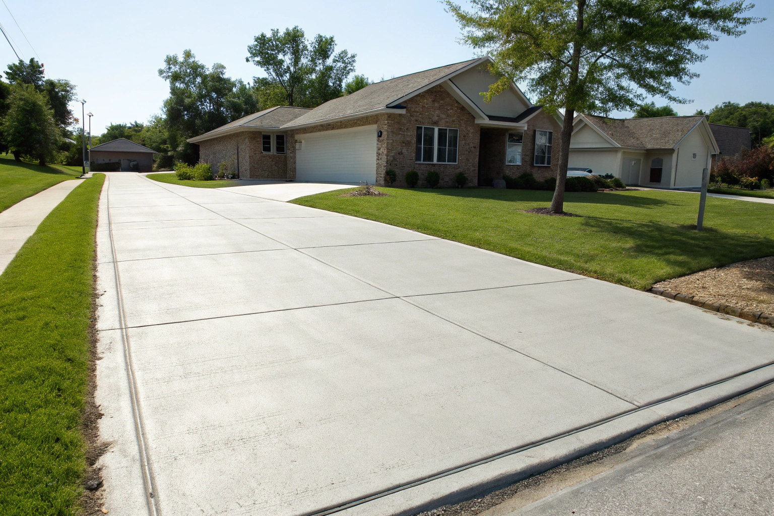 Freshly poured concrete driveway at a residential home in Coffs Harbour
